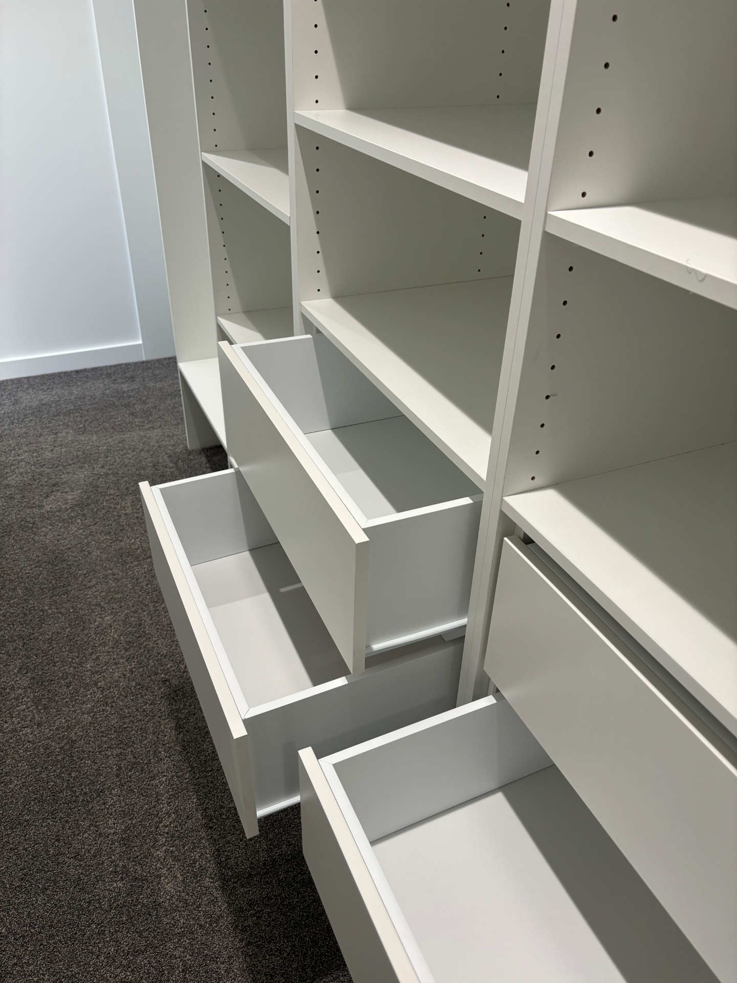 Organized wardrobe with clean drawers and shelves